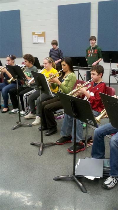Fox 8 News Reporter Annette Lawless plays trumpet with the 7th Grade Band!